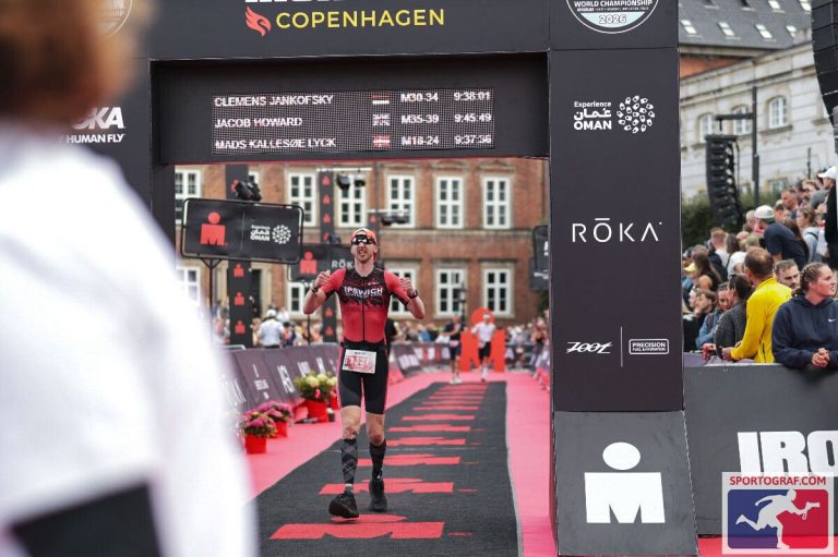 Jacob celebrating a PB at the finish line