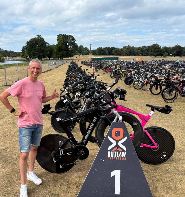 Mark posing with the pro's bikes!